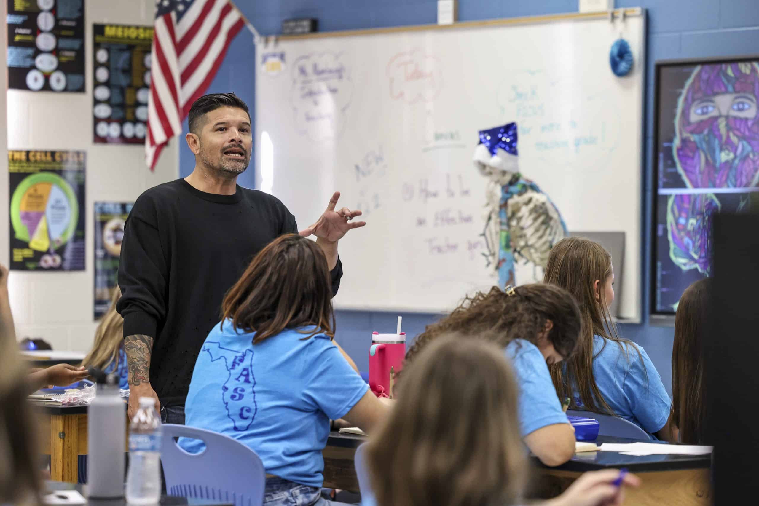 14.4marley Marley speaking in a classroom